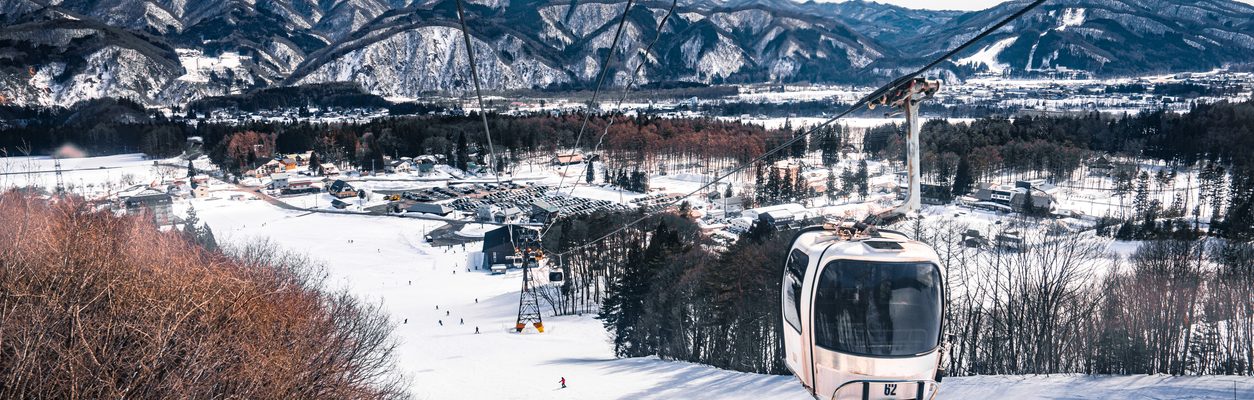 Skiing and snowboarding in Hakuba, Japan, with stunning mountain views and fresh powder snow