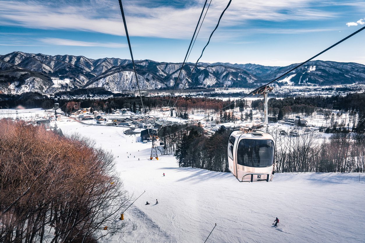 Skiing and snowboarding in Hakuba, Japan, with stunning mountain views and fresh powder snow